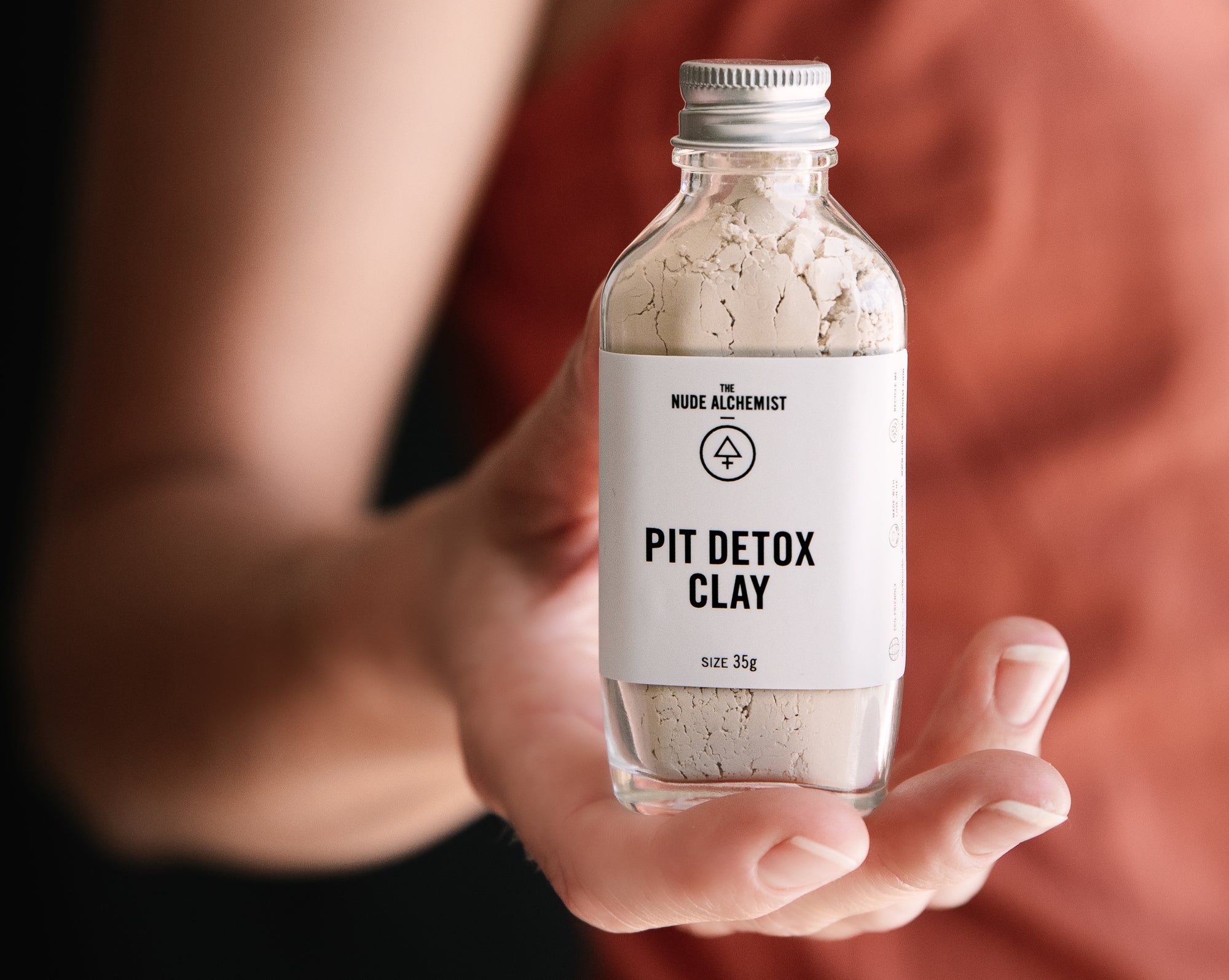 Pit Detox Clay being held